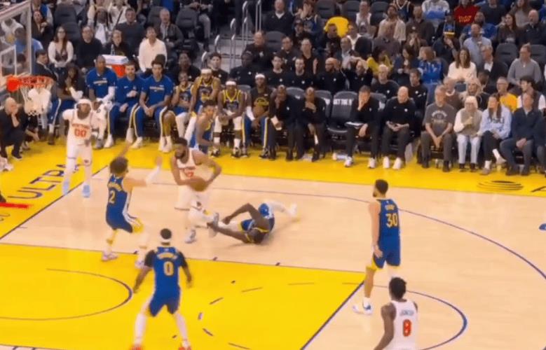 追梦倒地后拽住唐斯脚踝致其摔倒，裁判判定追梦一级恶犯